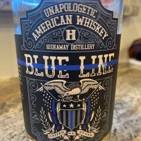 Hidaway Distillery: Unapologetic American Whiskey Blue Line