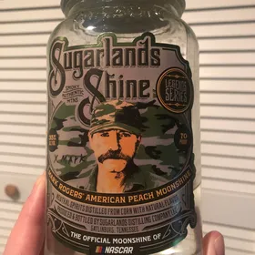 Sugarlands Shine Mark Rogers' American Peach Moonshine